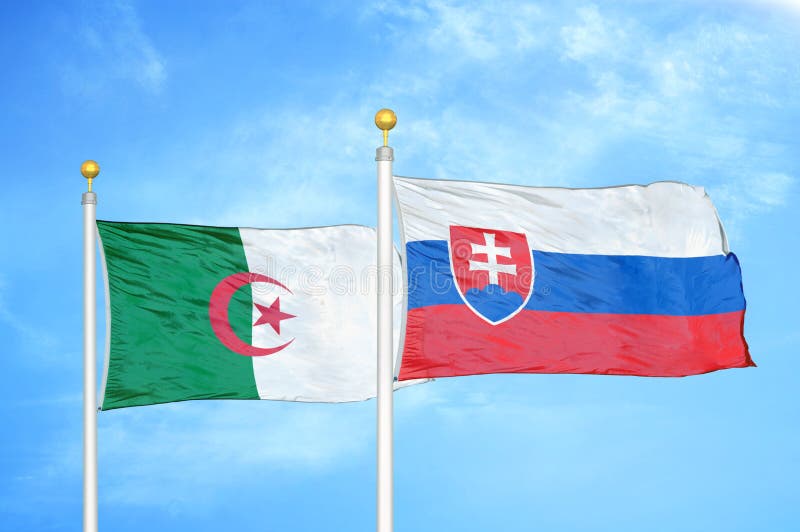 Algeria and Slovakia two flags on flagpoles and blue sky