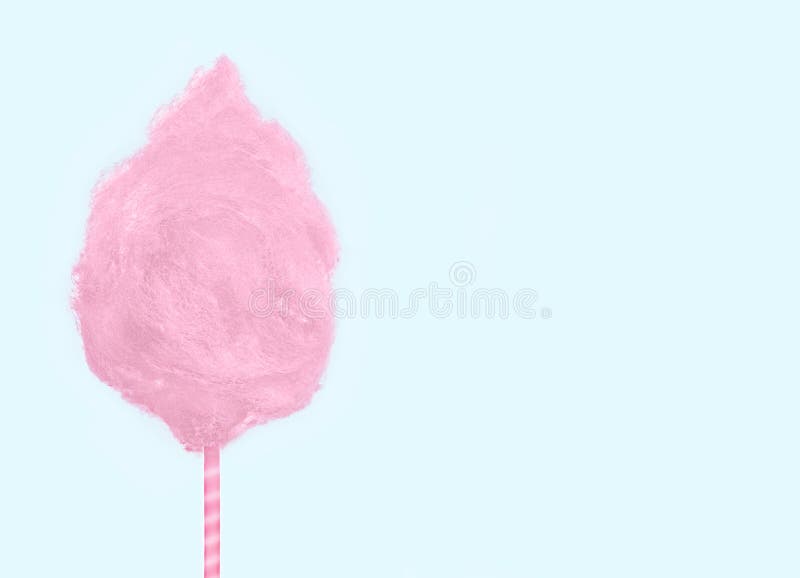 Algodão-doce rosa claro isolado sobre fundo verde-menta suave imagens de stock royalty free