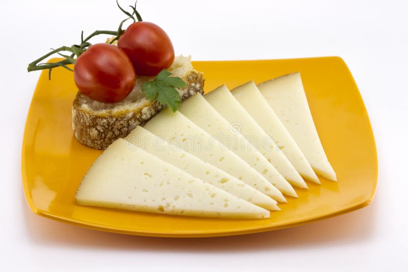 Algunas rebanadas de queso del manchego de España