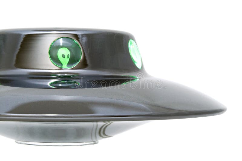 UFO with a green alien - Close-up of an UFO with a green alien, white background. UFO with a green alien - Close-up of an UFO with a green alien, white background