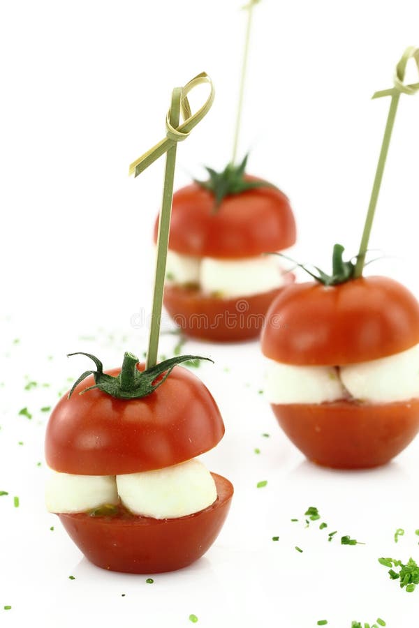 Finger food. Cherry tomatoes with mozzarella. Finger food. Cherry tomatoes with mozzarella