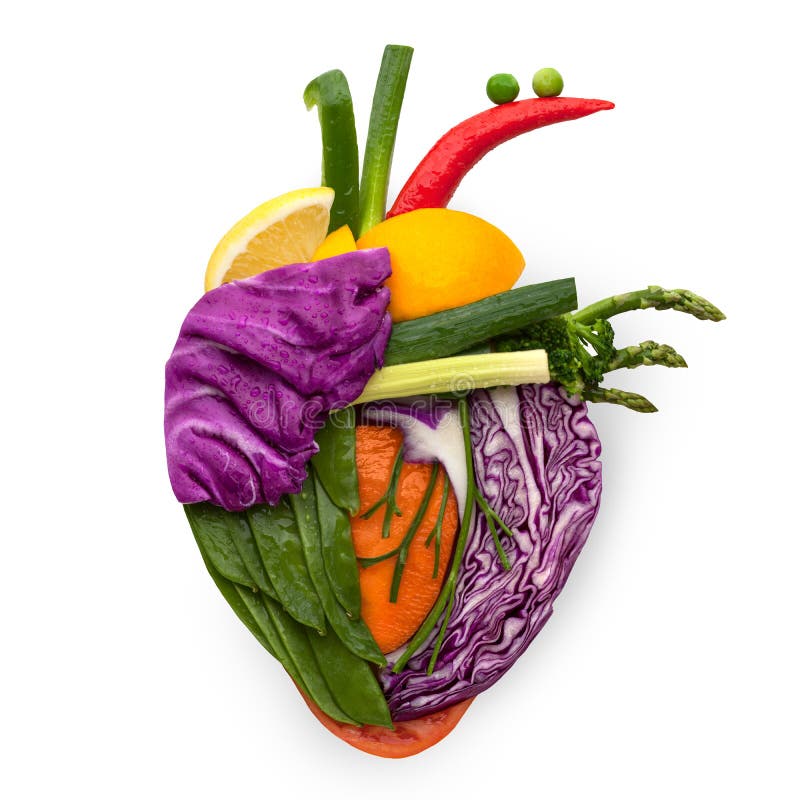 A healthy human heart made of fruits and vegetables as a food concept of smart eating. A healthy human heart made of fruits and vegetables as a food concept of smart eating.