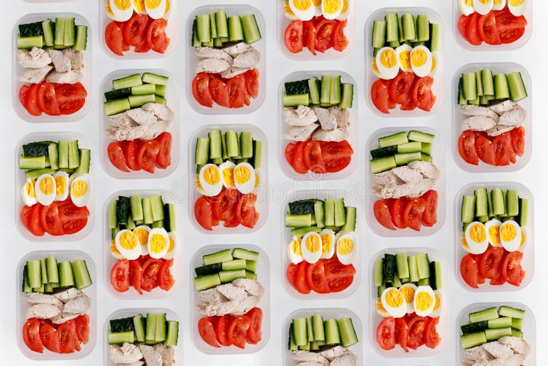 Healthy fitness food for the whole day. Multiple portions in containers on white background. Healthy fitness food for the whole day. Multiple portions in containers on white background