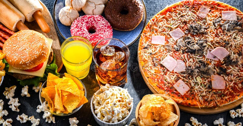 Alimentos que aumentan el riesgo de cáncer. comida chatarra fotografía de archivo libre de regalías