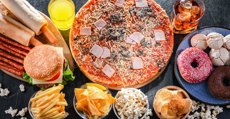 Alimentos que aumentan el riesgo de cáncer. comida chatarra imágenes de archivo libres de regalías