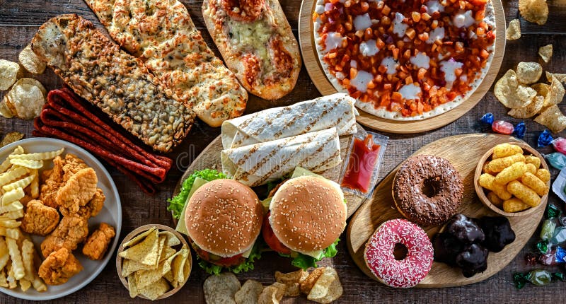 Alimentos que aumentan el riesgo de cáncer. Comida chatarra imagenes de archivo