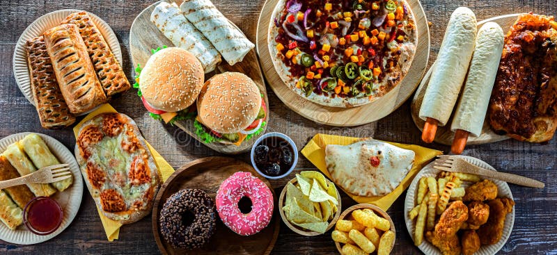 Alimentos que aumentan el riesgo de cáncer. Comida chatarra imagen de archivo
