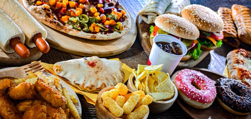 Alimentos que aumentan el riesgo de cáncer. Comida chatarra fotografía de archivo