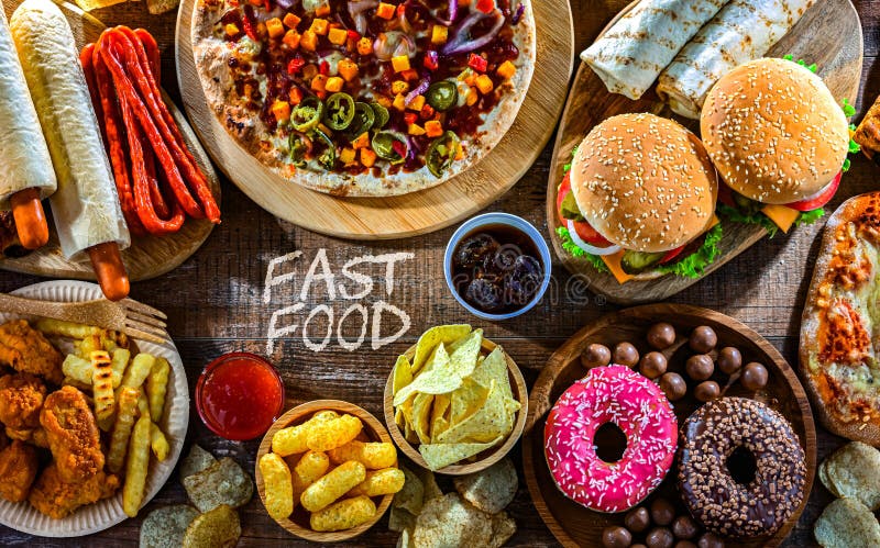 Alimentos que aumentan el riesgo de cáncer. Comida chatarra imagenes de archivo