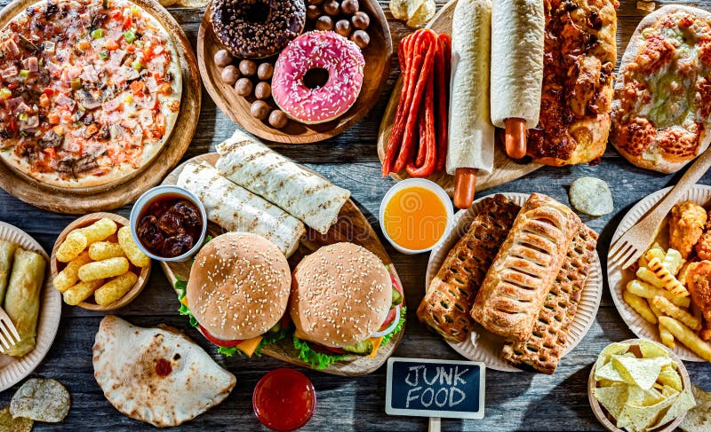 Alimentos que aumentan el riesgo de cáncer. Comida chatarra foto de archivo