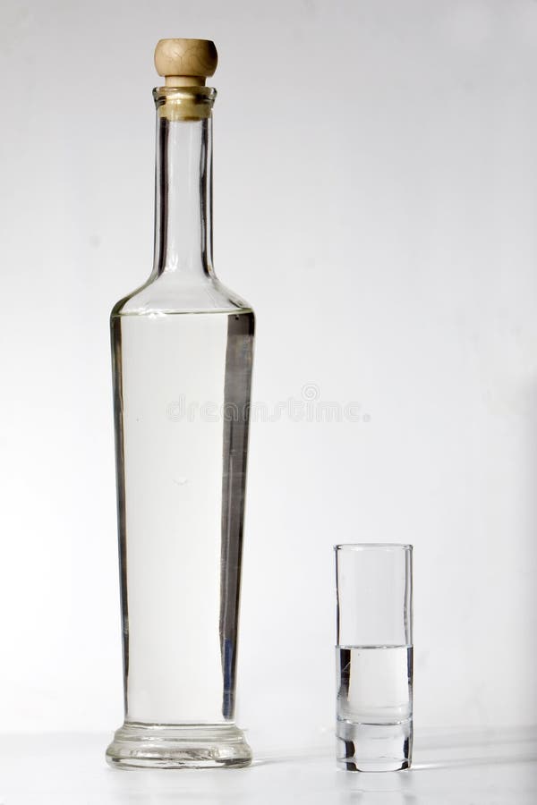 Alcohol drink (vodka) and glass. Alcohol drink (vodka) and glass