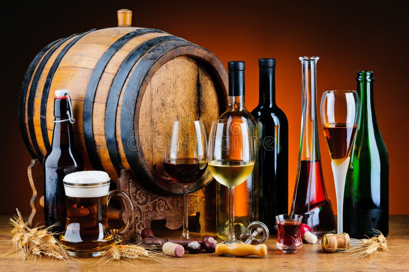 Still life with different alcoholic drinks and wooden barrel. Still life with different alcoholic drinks and wooden barrel