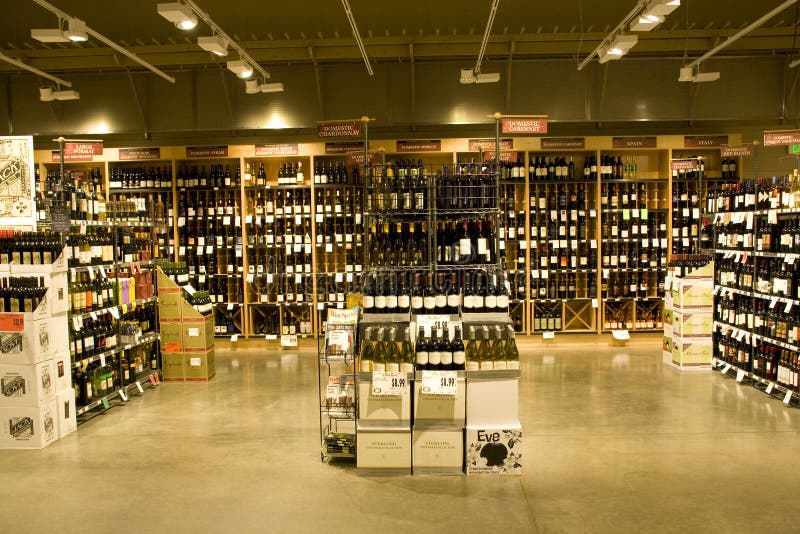 A big alcohol store with huge selection of alcohols, wines or other drinks. A big alcohol store with huge selection of alcohols, wines or other drinks.