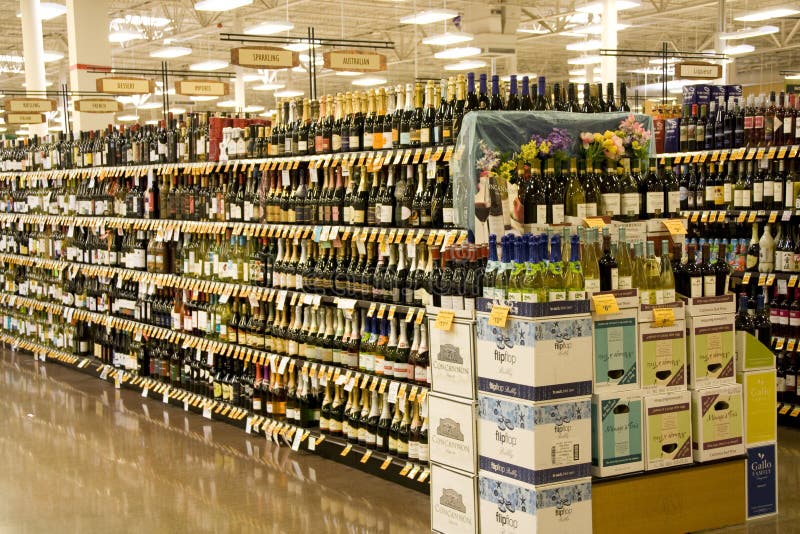 Huge selection of alcohol in supermarket. Fred Meyer, Washington. Washington just passed the law allowing supermarkets to sell strong alcohol. More alcohol for sales in store after that. Huge selection of alcohol in supermarket. Fred Meyer, Washington. Washington just passed the law allowing supermarkets to sell strong alcohol. More alcohol for sales in store after that.