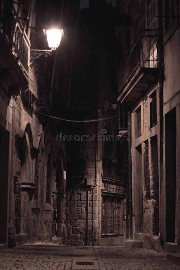 An alley by night