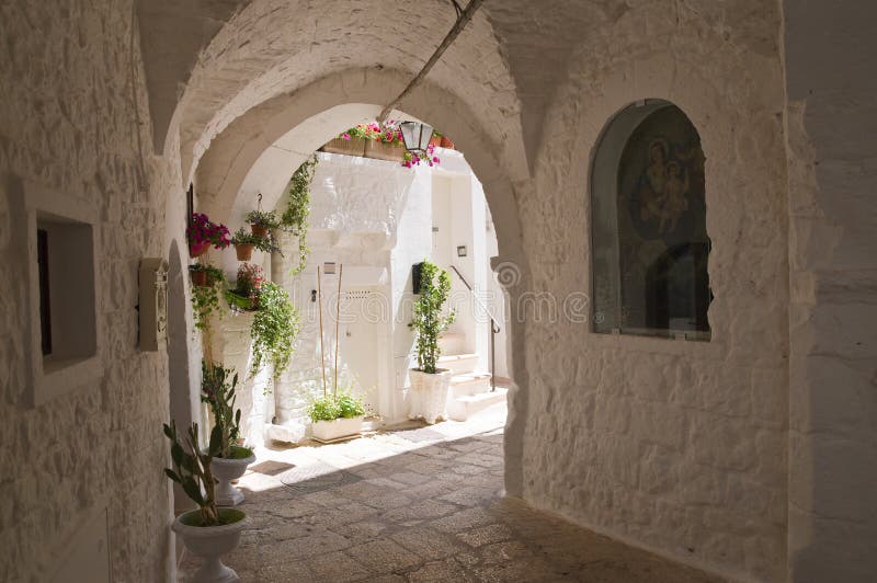 Alleyway. Cisternino. Puglia. Italy. royalty free stock image Alleyway. Cisternino. Puglia. Italy. royalty free stock image