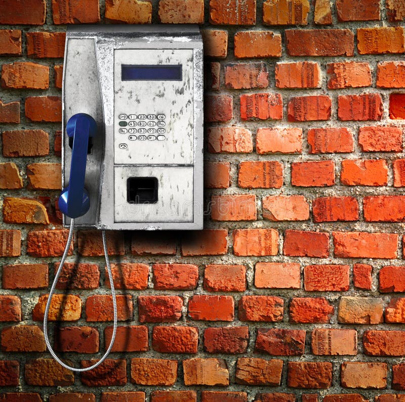 Allgemeines Telefon auf Wandhintergrund lizenzfreie stockfotos Allgemeines Telefon auf Wandhintergrund lizenzfreie stockfotos