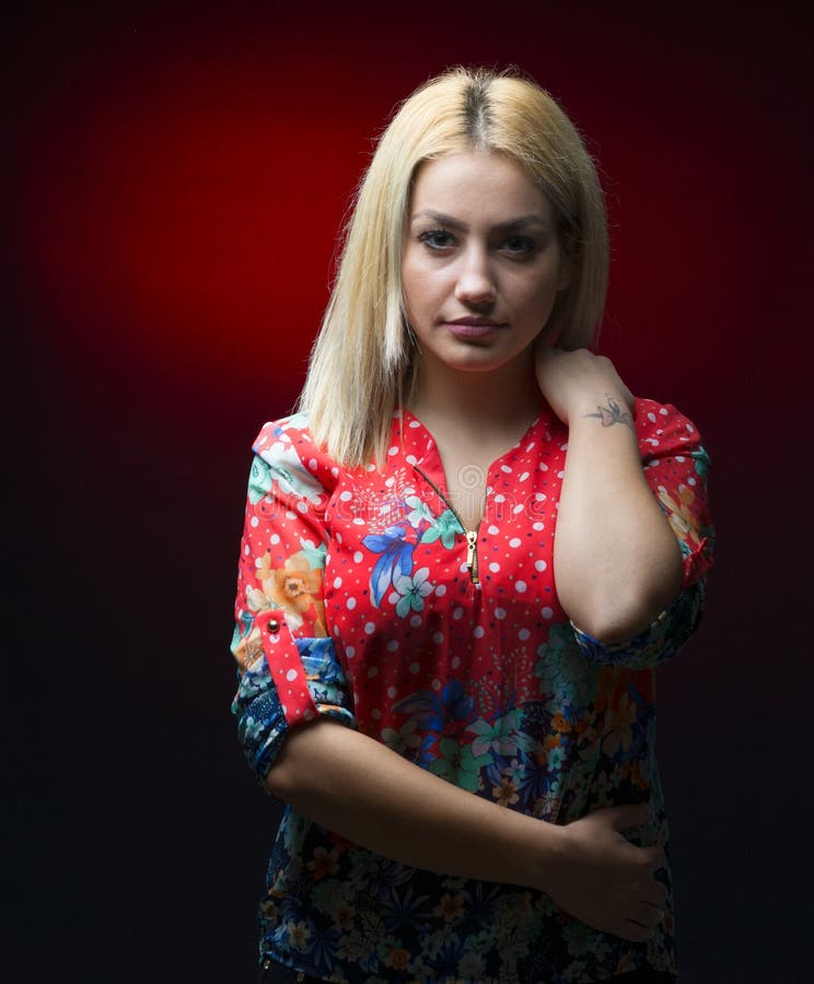 Alluring Young Blonde Posing Over Dark Background Stock Pho
