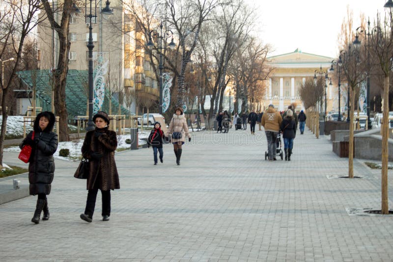 Almaty, Kazakhstan, Almaty. Early winter time, people walk. Passersby