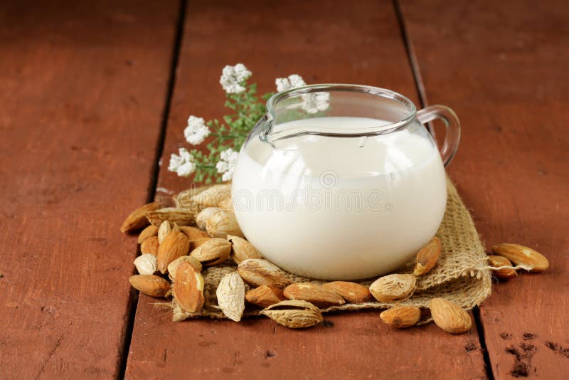 Almond milk in a glass jug stock photo. Image of vegetarian 36990888