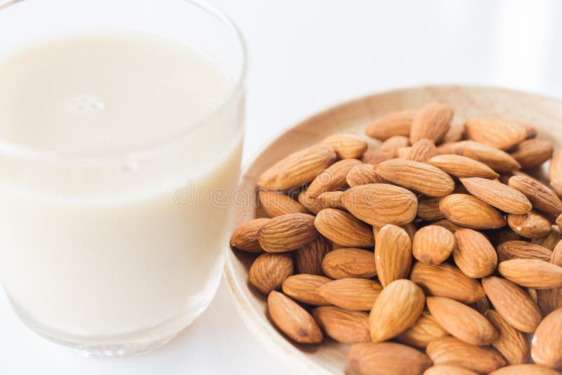 Almond Milk and Grain on White Kitchen Table Stock Image Image of protein, brown 57170949