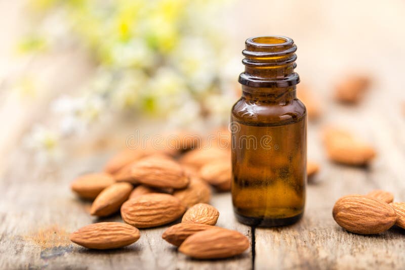 Almond essential oil stock photo. Image of isolated, care 14365016