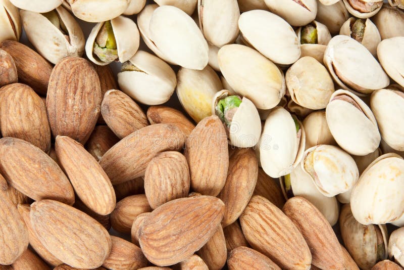 Almond and pistachios background royalty free stock photos