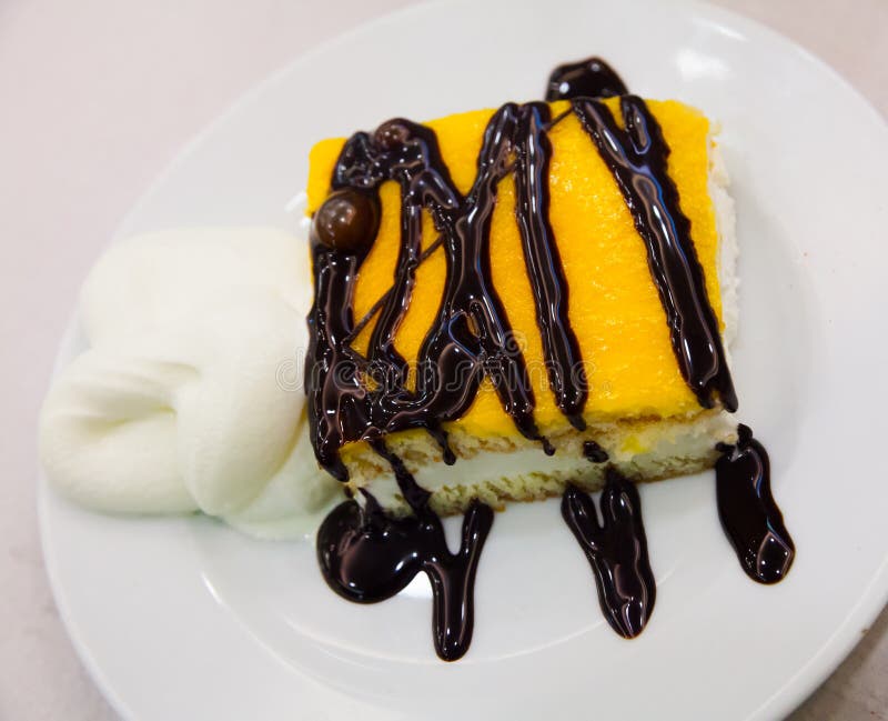 Almond Sponge Cake with Vanilla and Chocolate Light Mousse Stock Photo