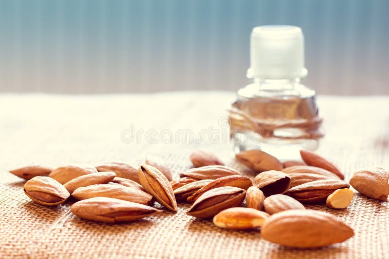 Almonds and almond oil stock photo. Image of nature 140063036
