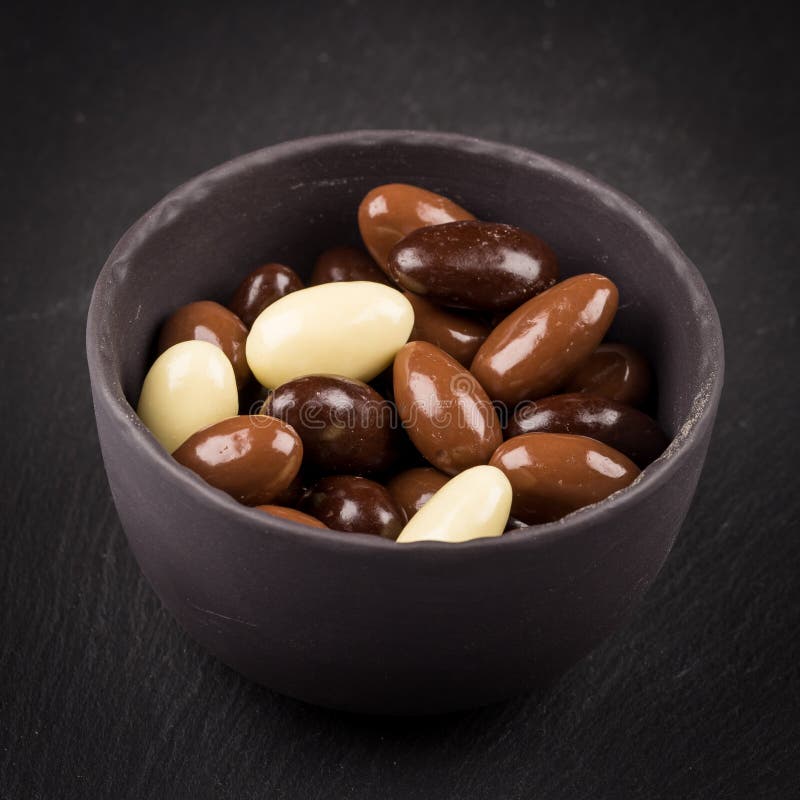 Almonds in chocolate stock image. Image of crunchy, candy 275145465