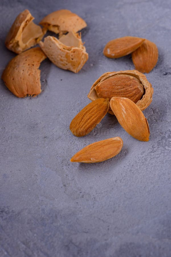 Almonds nuts with nutshell stock image. Image of protein 103291187