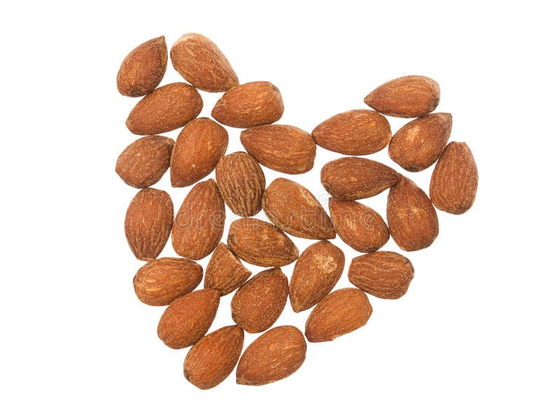 Almonds in shape of heart on white background