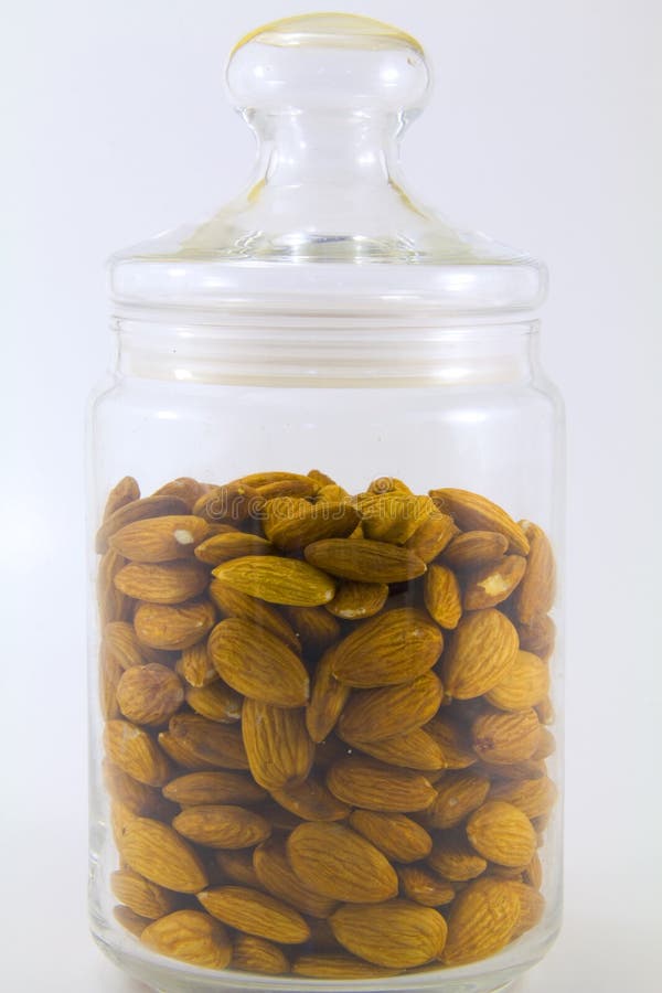 Almonds in a storage jar stock image. Image of white 18323219