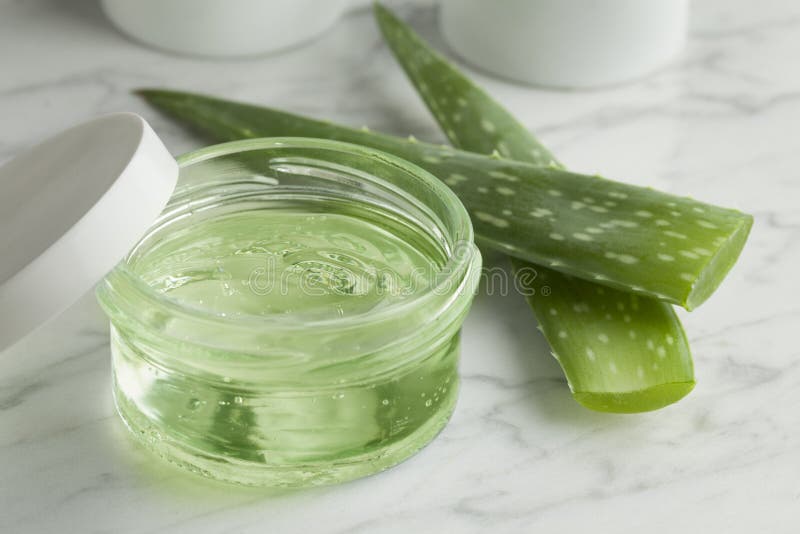 Aloe Vera gel in a glass jar royalty free stock images