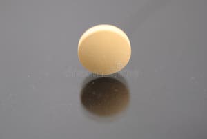Alone Yellow Round Tablet Stock Image Image Of Capsules 112383221 Alone Yellow Round Tablet Stock Image Image Of Capsules 112383221