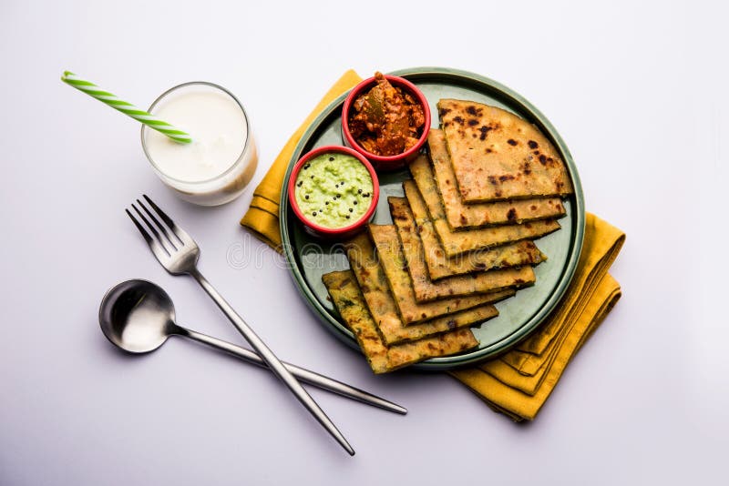 Aloo Paratha / Indian Potato stuffed Flatbread. Served with fresh fresh Lassi / Lassie or buttermilk