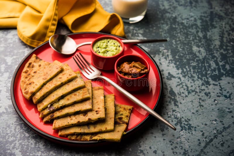 Aloo Paratha / Indian Potato stuffed Flatbread. Served with fresh fresh Lassi / Lassie or buttermilk