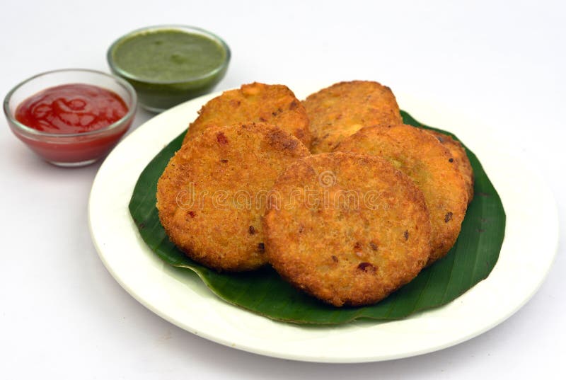 Aloo-tikki - Kartoffelpastetchen stockfotografie Aloo-tikki - Kartoffelpastetchen stockfotografie