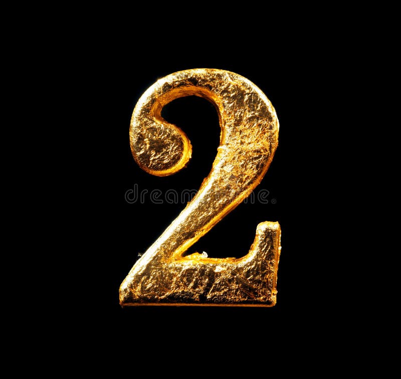 Alphabet and numbers in gold leaf stock image