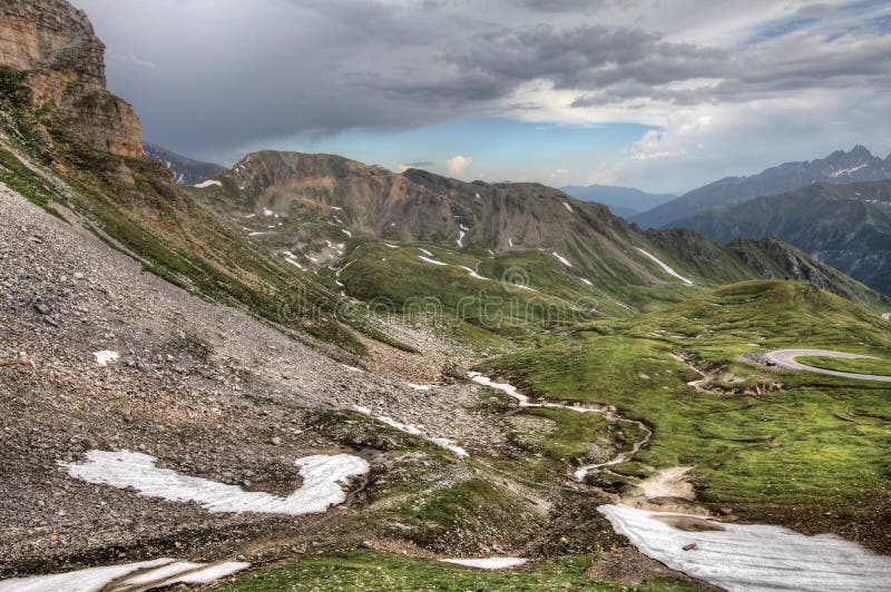 HDR photo of Alps in Austria. View from famous Hochtor pass on Hochalpenstrasse. Hohe Tauern National Park. HDR photo of Alps in Austria. View from famous Hochtor pass on Hochalpenstrasse. Hohe Tauern National Park.