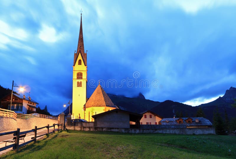 Alpine church at evening stock photo. Image of scenic 21406692