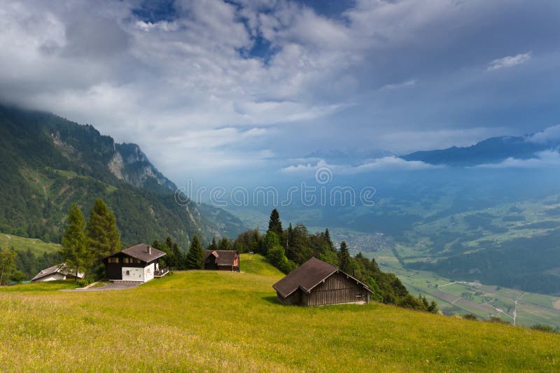 Alpine country houses in Swiss Alps royalty free stock photos Alpine country houses in Swiss Alps royalty free stock photos