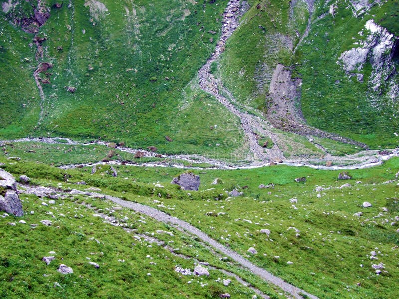 The Alpine Valley of Im Loch at the Glarus Alps mountain range