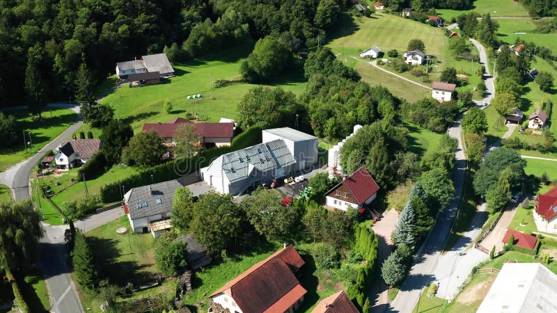 Alpine village Kopivnik in Slovenia, aerial view, Pohorje landscape