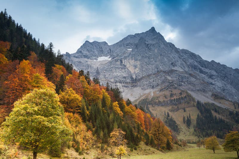 Alps autumn mountain landscape with dark blue sky. Austria, Tiro