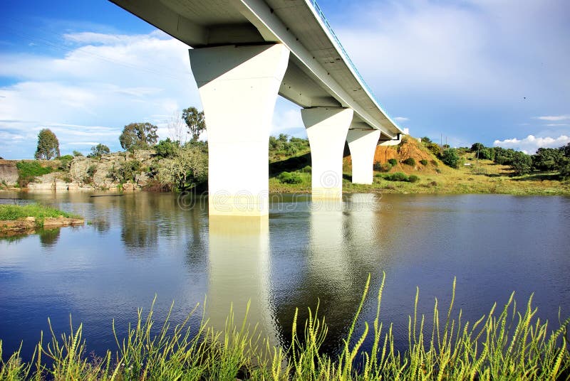 Alqueva lake and bridge. royalty free stock photography