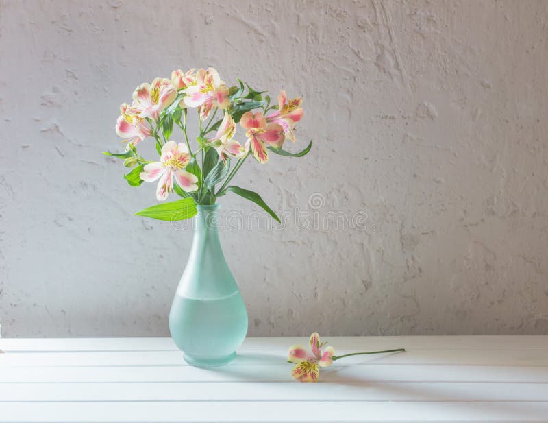 Alstroemeria in vase on white background royalty free stock photos Alstroemeria in vase on white background royalty free stock photos