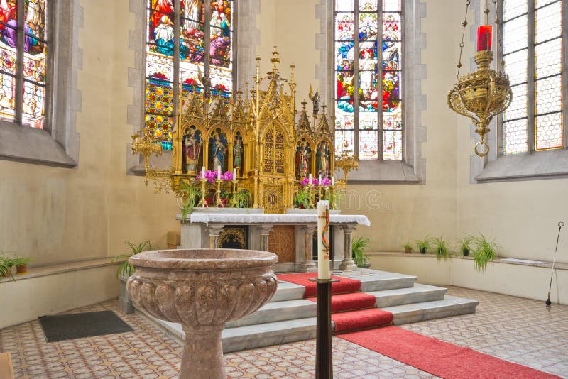 Altar and baptismal font in catholic church royalty free stock image Altar and baptismal font in catholic church royalty free stock image
