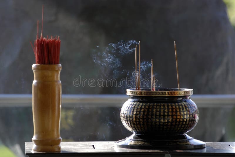 Altar and joss stick in the chinese temple