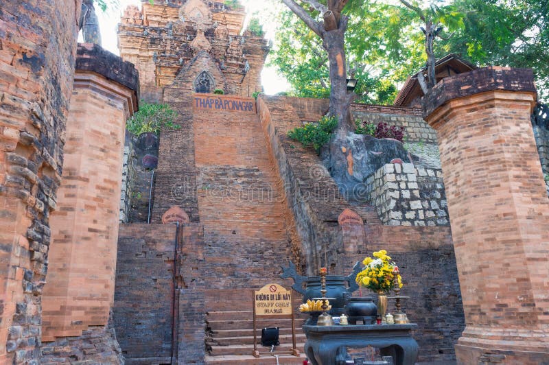 Altar With Offerings And Flowers And A Tall Staircase To 